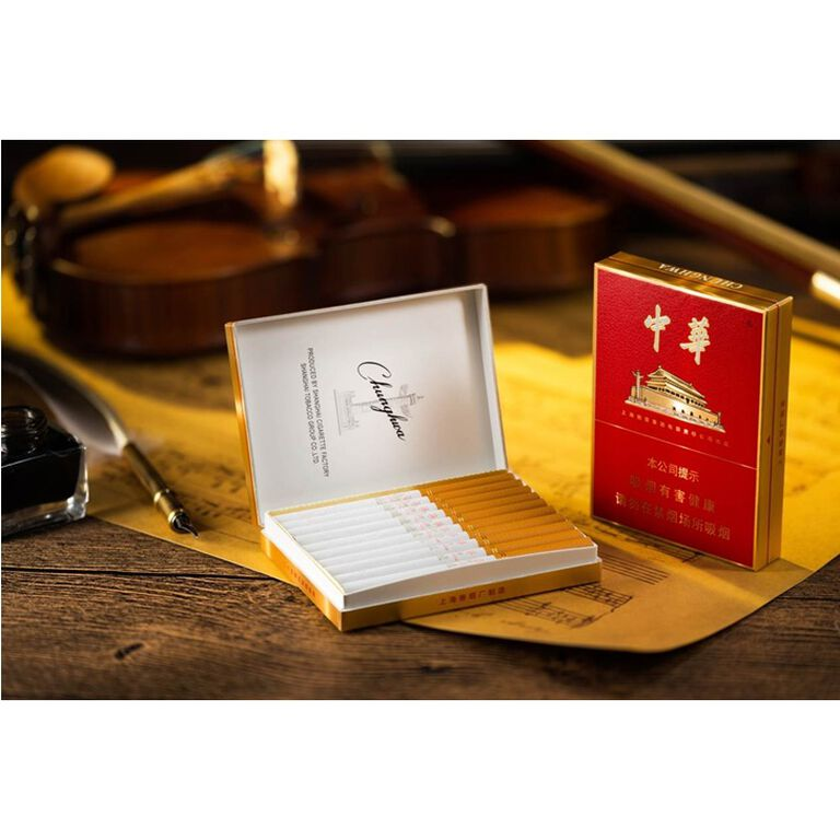 Chunghwa golden slim cigarette pack opened on a table showing slim cigarette layout