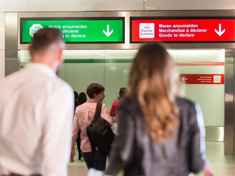 Airport customs declaration channel for tobacco import compliance